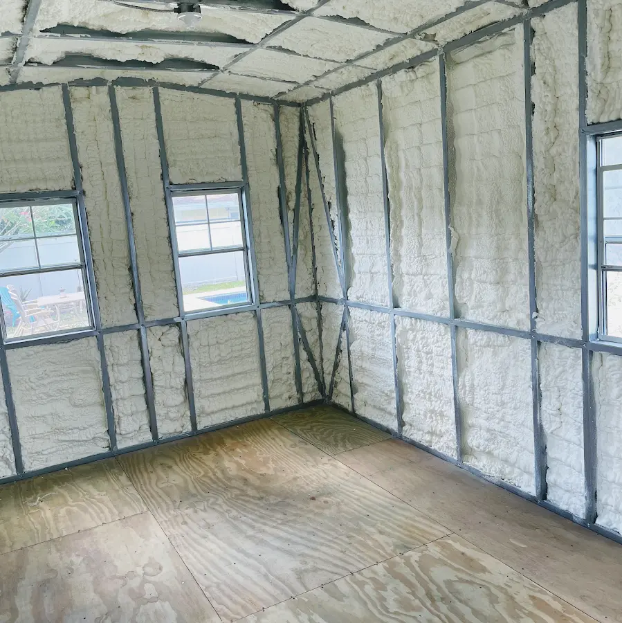 Closed-cell spray foam insulation applied to wall cavities in a residential project in Middleton